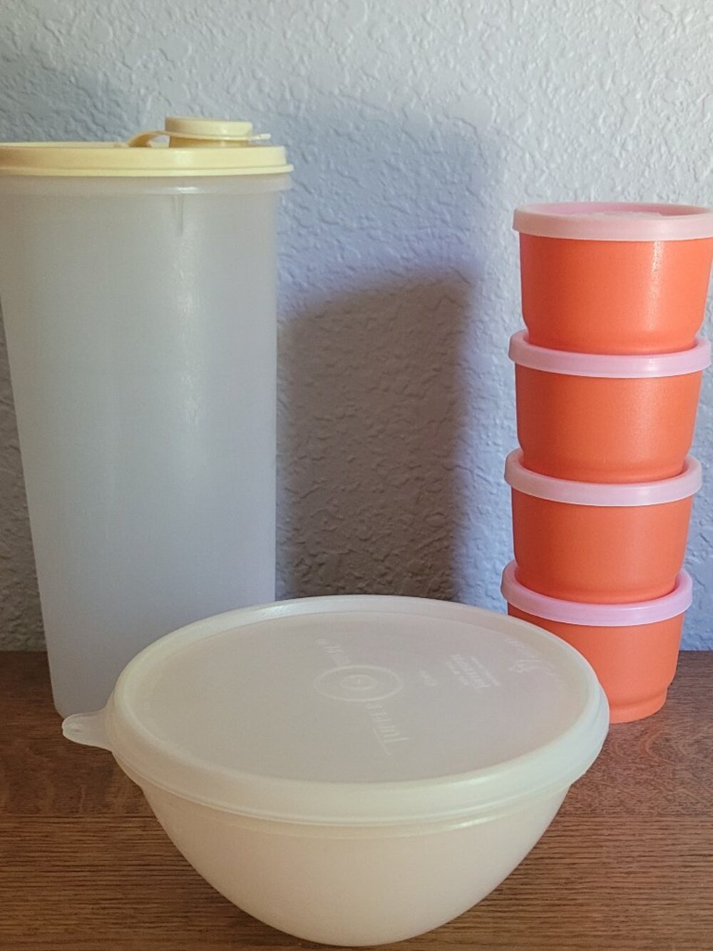 1 Tupperware bowl/ 4 Orange Snack Cups/lamarle 48 oz Canister